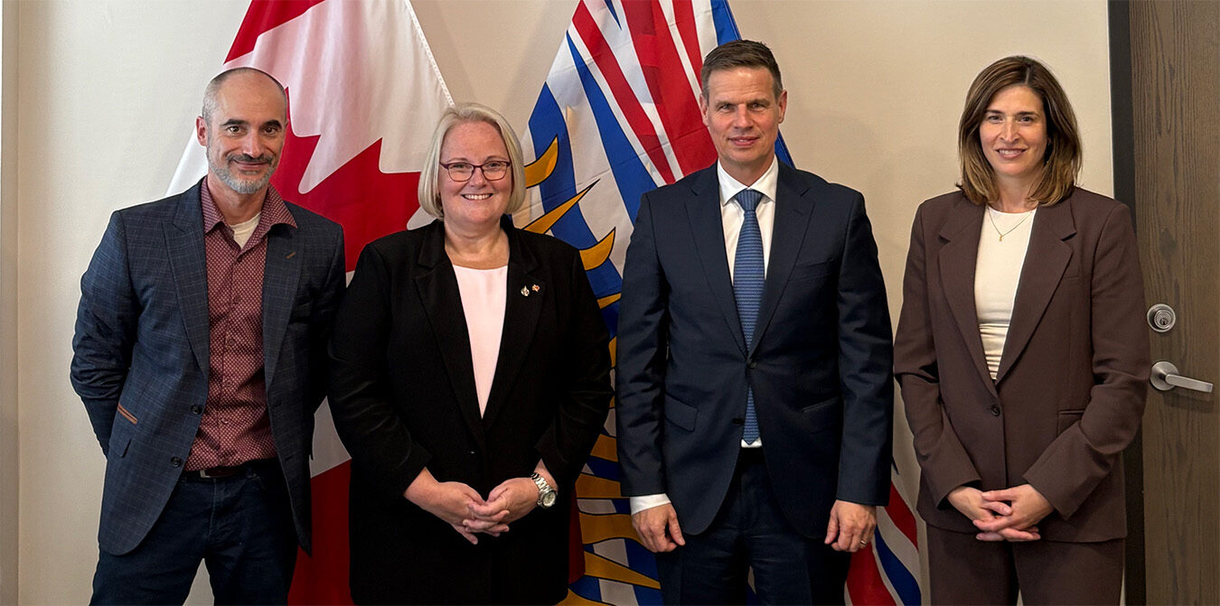 Brent Korobanik (Heidelberg Materials), Board Chair Oliver Patsch (Heidelberg Materials), and Sarah Petrevan, Vice President of Industrial Decarbonization and Sustainability at CAC, with Jill McKnight, Minister of Veterans Affairs.