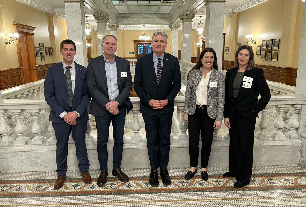 Aaron Armstrong (Teeswater Concrete), Karl Rammler (Dufferin Concrete), Resha Watkins (St Marys Cement, a Votorantim Cimentos Company), and Sarah Petrevan, Vice President of Industrial Decarbonization and Sustainability at CAC, with Ottawa South MPP John Fraser.