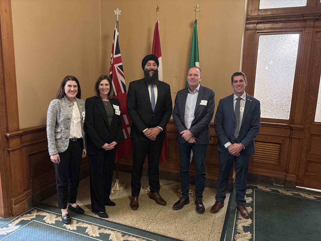 Resha Watkins (St Marys Cement, a Votorantim Cimentos Company), Sarah Petrevan, Vice President of Industrial Decarbonization and Sustainability at CAC, Karl Rammler (Dufferin Concrete), and Aaron Armstrong (Teeswater Concrete) with Ontario Minister of Transportation Prabmeet Singh Sarkaria.